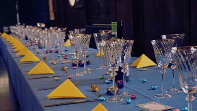 Elegant banquet table setup with crystal glassware for formal events at UCS Venues.