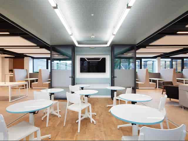 Modern meeting space at UCS Venues with flexible layout for collaboration and presentations.