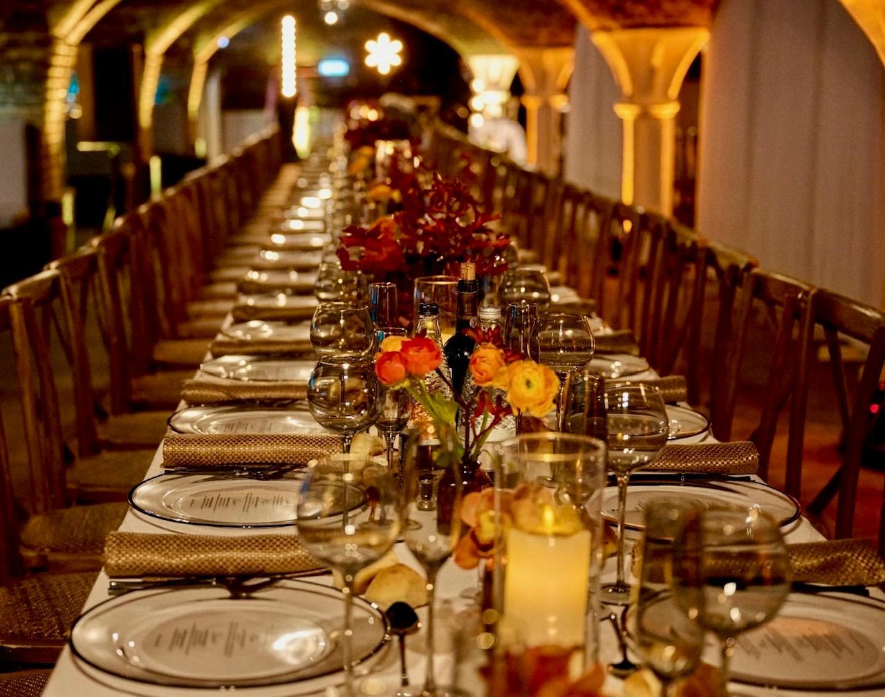 Elegant banquet table with floral centerpieces at Dockside Vaults event venue.