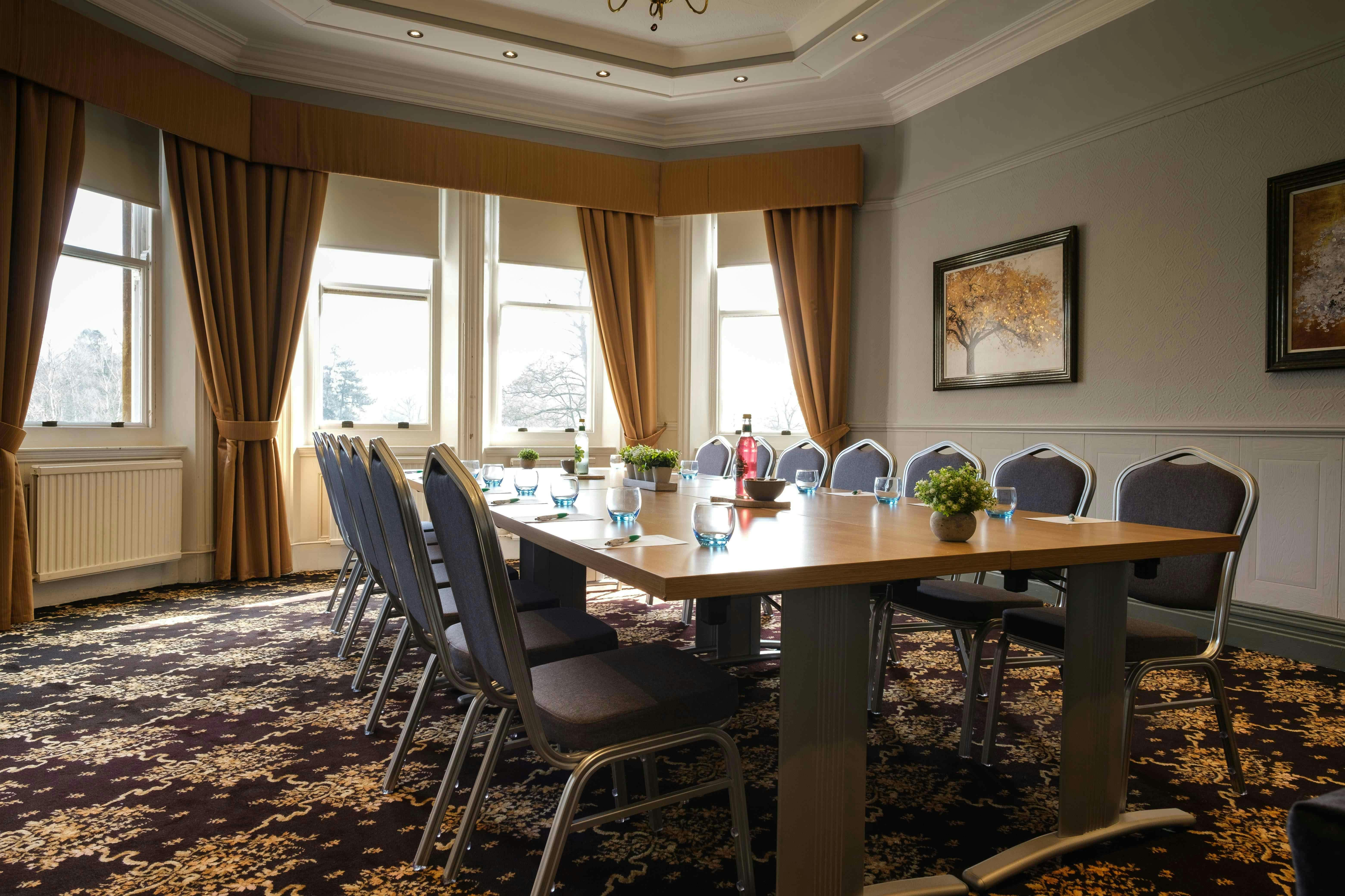 Wentworth Room at Moor Hall Hotel: spacious meeting room with natural light for events.