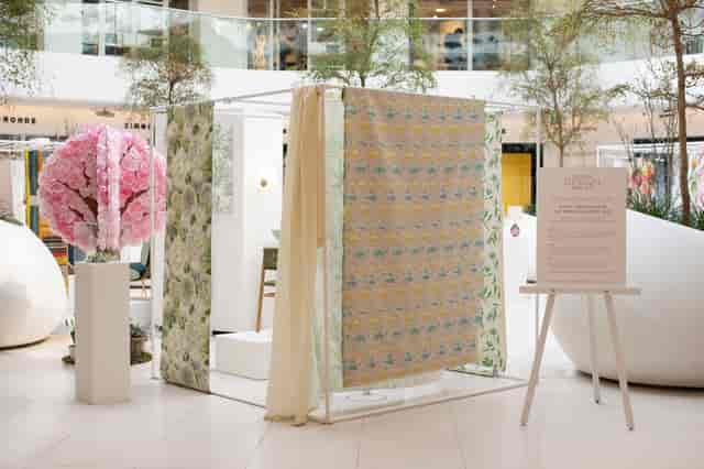 Stylish event setup with floral decor at Design Avenue, Chelsea Harbour for exhibitions.