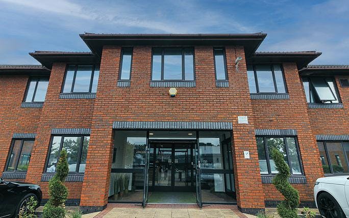 Modern meeting room in No.3 Fulwood, featuring large windows for corporate events.