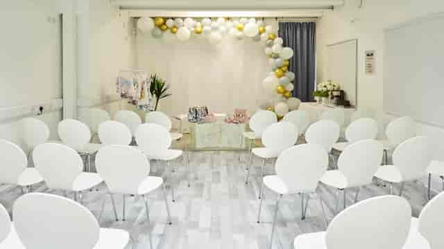 Event space at S3 Royal Arsenal with balloon arch, ideal for workshops and celebrations.