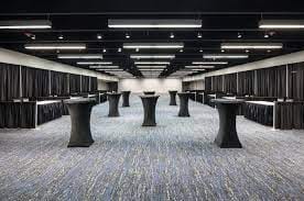 Woodway Hall at The Westin Galleria: modern event venue with high-top tables for receptions.