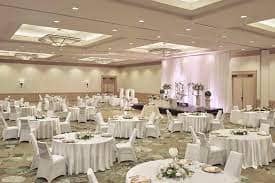Bayshore Grand Ballroom at The Westin, elegant wedding venue with floral centerpieces.