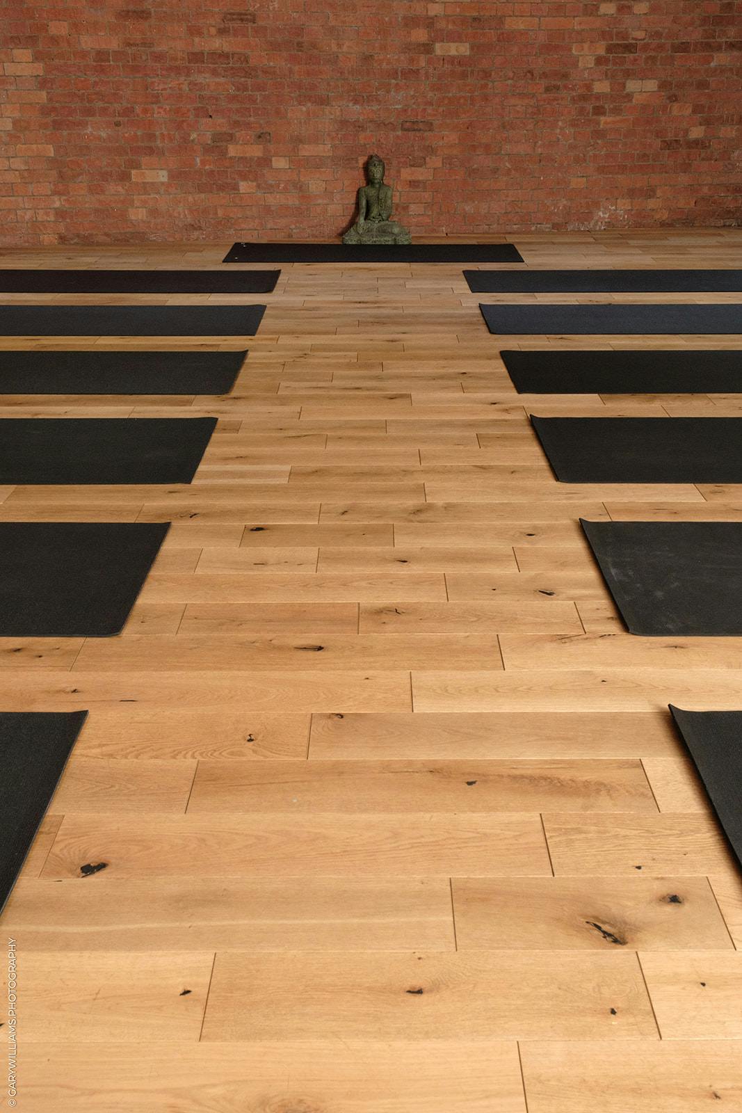 Serenity Studio London with black yoga mats, ideal for wellness retreats and mindfulness workshops.