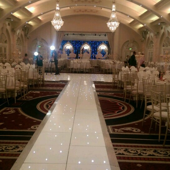 Elegant banquet hall in The Emperor Suite, featuring a polished runway for weddings and events. - Banner
