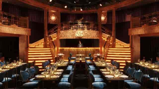 Elegant Mezzanine Area in Lio London with plush blue seating for corporate events.