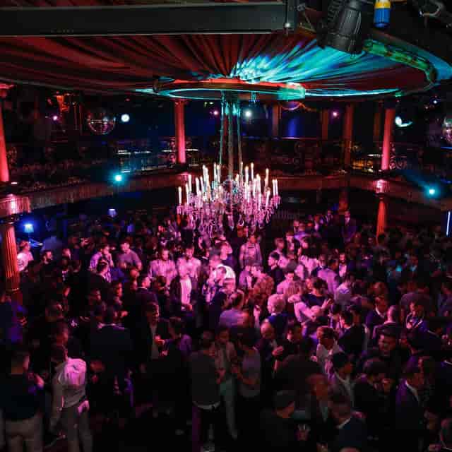 Vibrant event space in Lio London with chandelier, perfect for networking and celebrations.