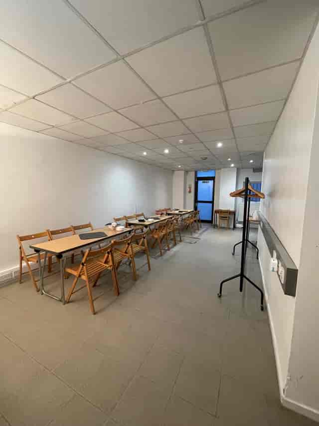 Versatile meeting space at Institut français du Royaume-Uni for workshops and gatherings.