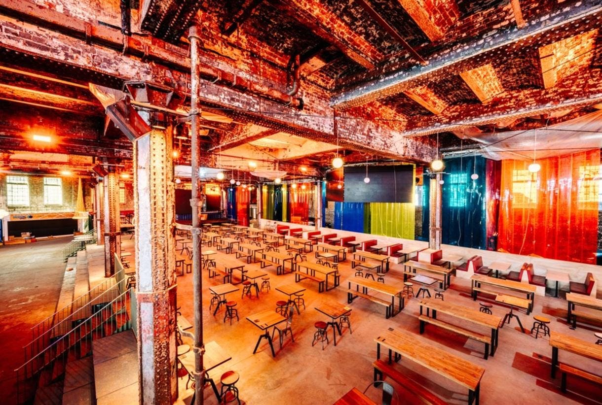 Food Hall at Escape to Freight Island, industrial venue for networking events and workshops.