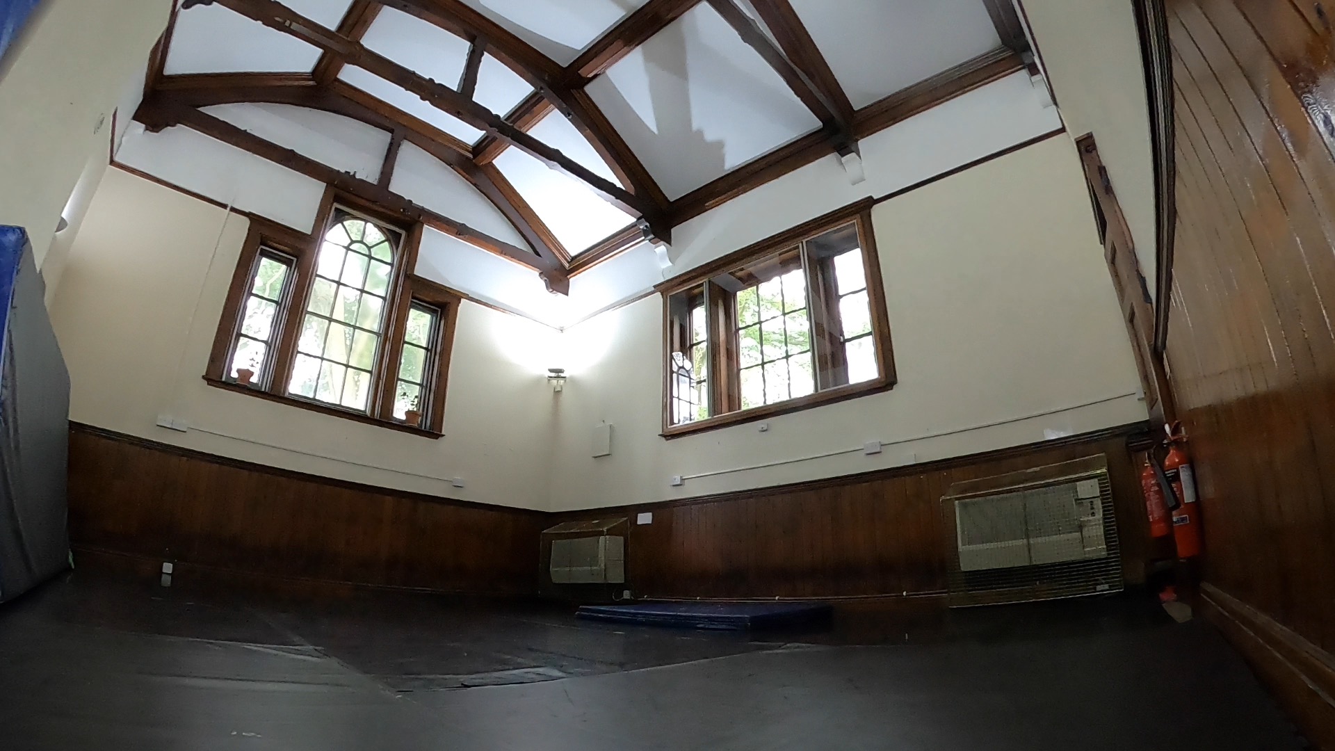 Spacious meeting room with high ceilings at West Midlands Circus Centre for workshops. - Banner