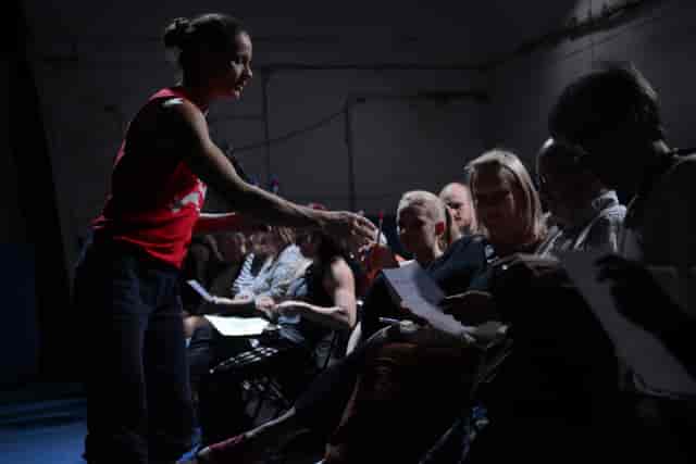 Engaged audience at West Midlands Circus Centre, highlighting interactive meeting dynamics.