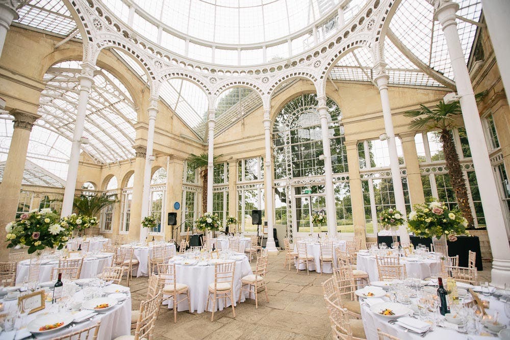 Elegant event space in Syon Park with round tables, perfect for weddings and corporate events.