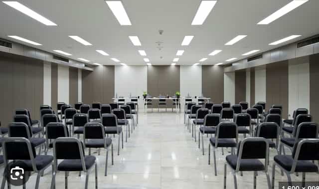 Modern conference room in Altis Grand Hotel, ideal for seminars and corporate events.