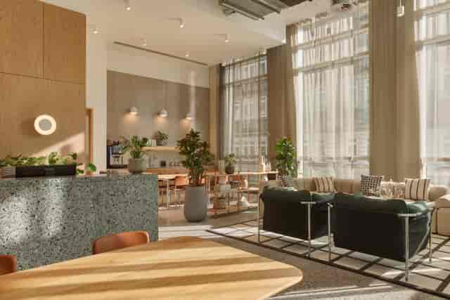 Modern meeting space with large windows, ideal for networking and brainstorming events.