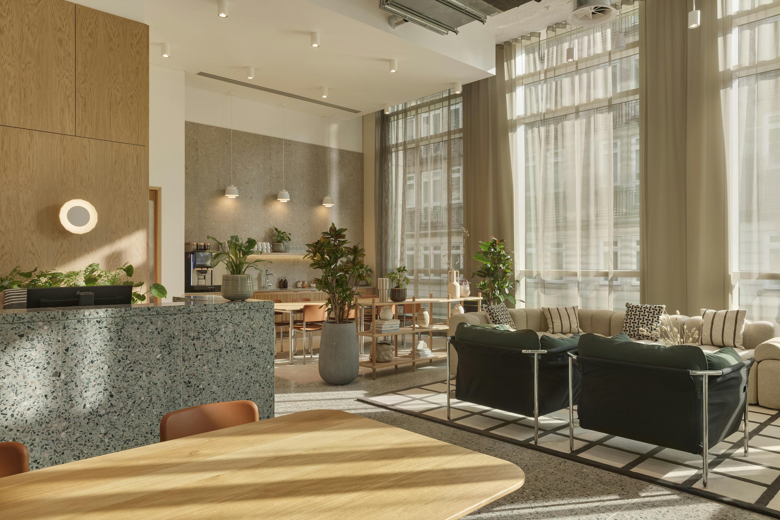 Modern meeting space with large windows, ideal for networking events and conferences.