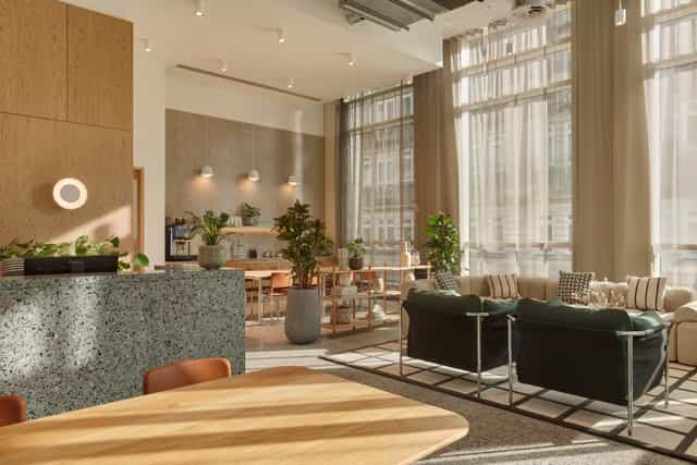 Modern meeting space with large windows, ideal for networking events and conferences.