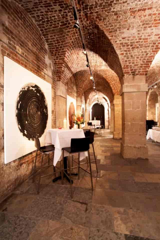 Elegant event space with exposed brick arches at The Gallery in the Crypt, St Martin-in-the-Fields.