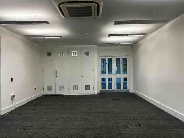 Sapphire Suite meeting room with natural light, ideal for workshops and presentations.