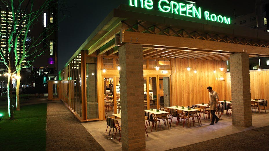 Private Dining Room at National Theatre, modern venue for events with warm wooden decor.