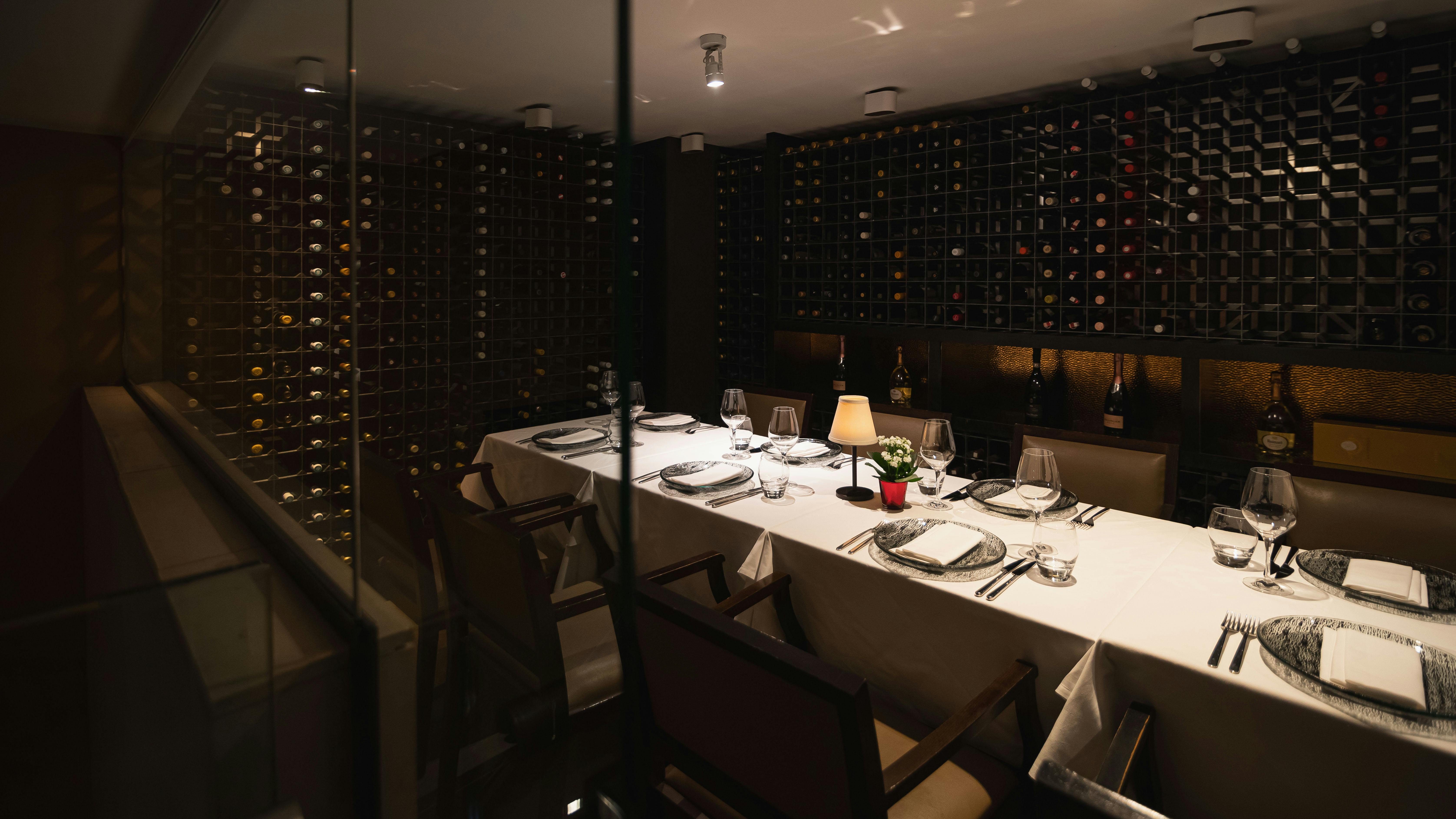 Intimate dining room with elegant decor for corporate dinners and exclusive events.