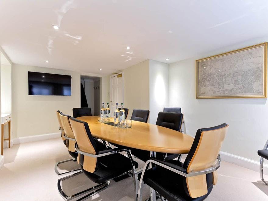 Modern conference room at Celesta Venues, ideal for professional meetings and presentations.