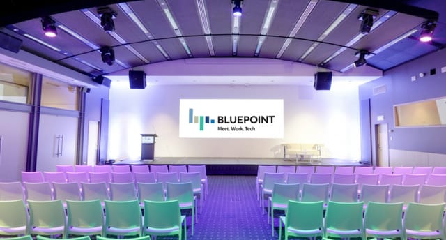 Modern event space at Einstein ABC, Bluepoint Brussels, ideal for corporate presentations.