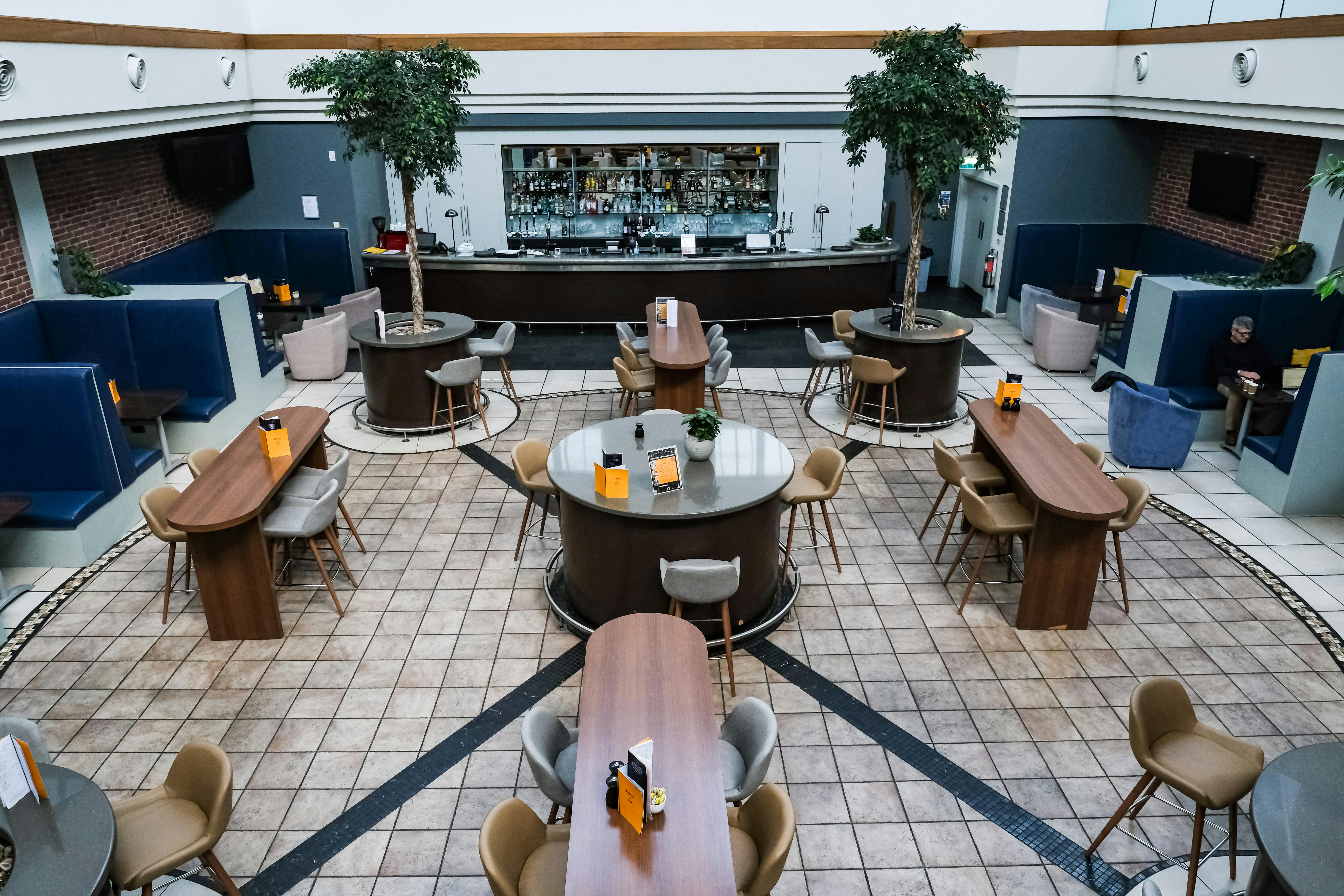 Atrum Bar at Voco Reading: modern event space with flexible seating and greenery.