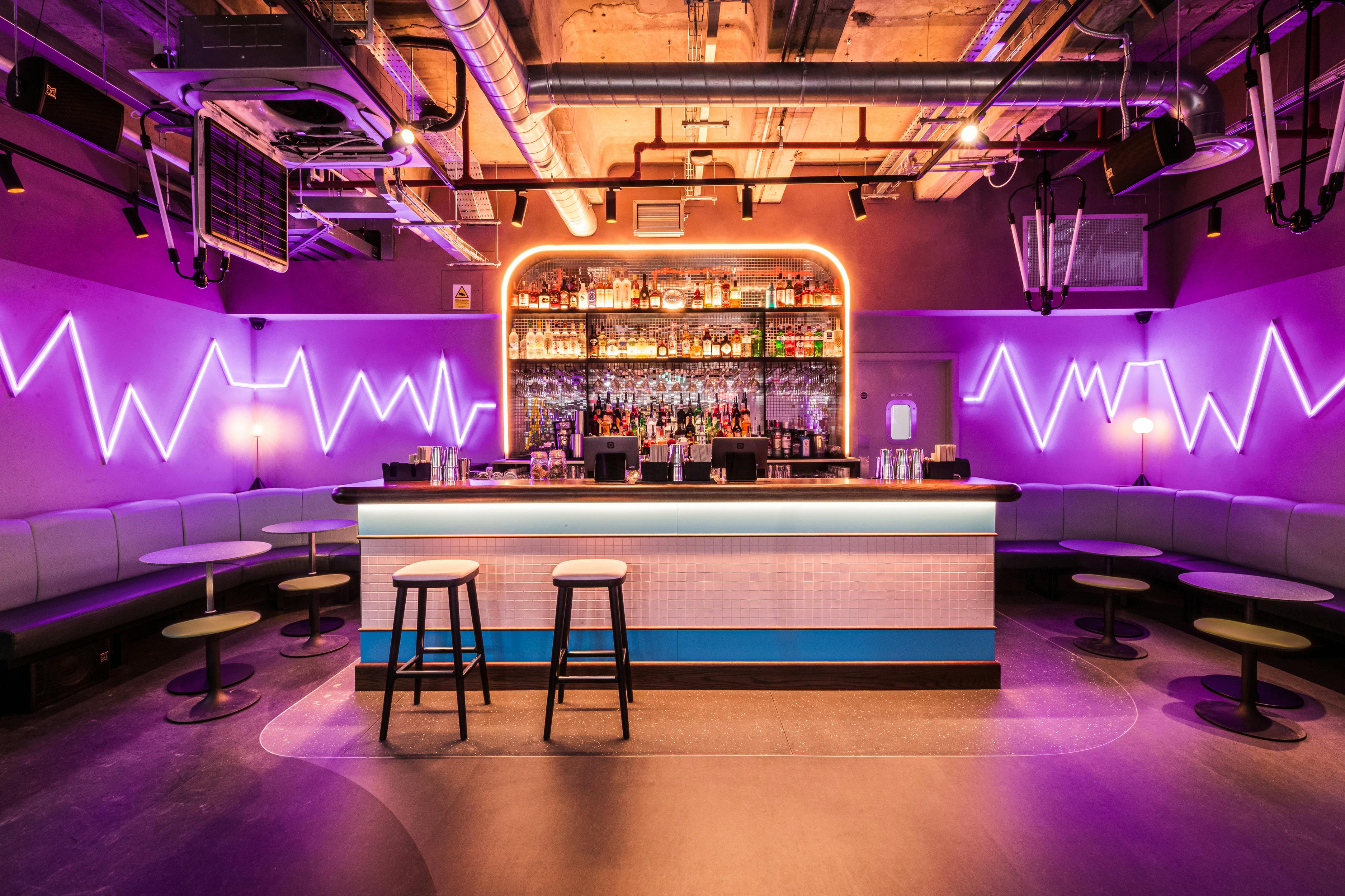 Vibrant bar venue hire at Lucky Voice Waterloo for networking events and social gatherings.