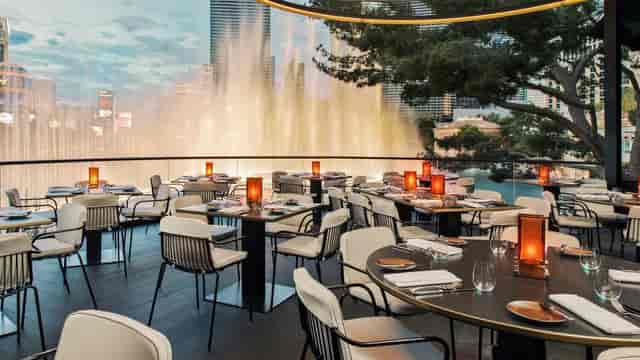 Private dining room in Spago with elegant tables, ideal for upscale events and corporate dinners.