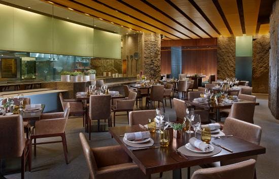 Private dining room with elegant decor for corporate events and gatherings.