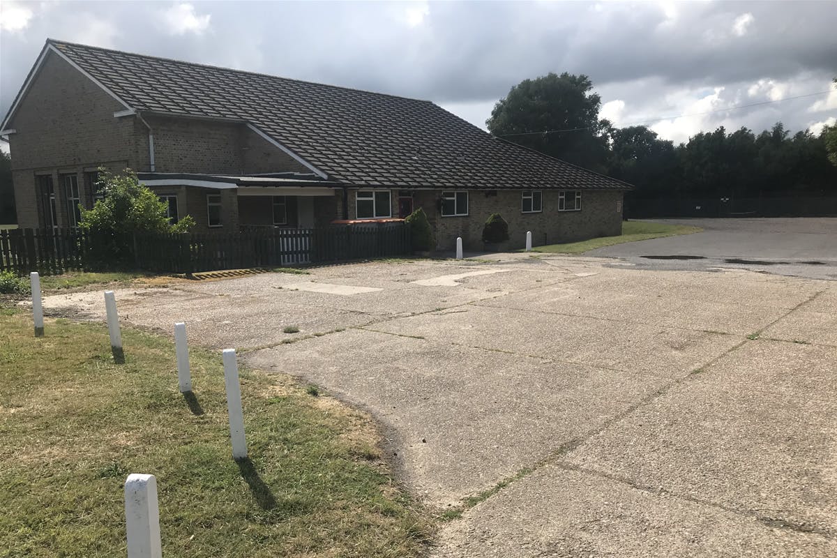 Spacious Hall in Arkley Village Hall, ideal for events with ample parking and greenery.