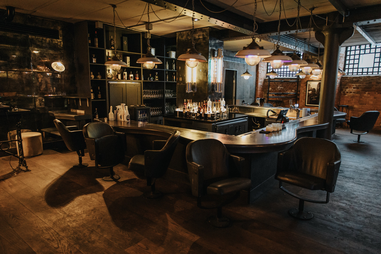 Stylish industrial bar in Brix Ldn, perfect for cocktail receptions and networking events. - Banner