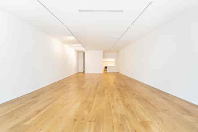 Spacious minimalist event space in Mayfair Gallery, perfect for corporate meetings and workshops.
