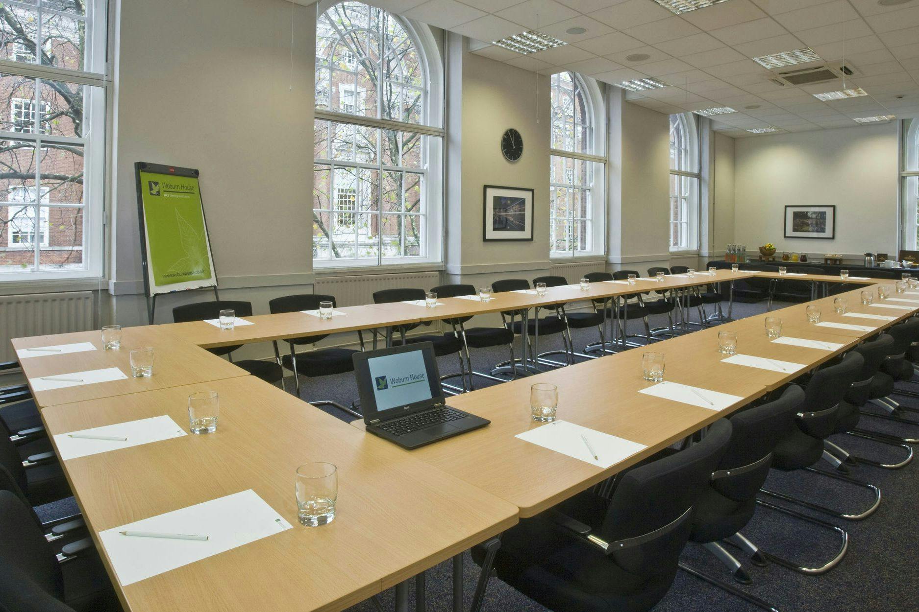UUK Boardroom at Woburn House, U-shaped setup for professional meetings and collaboration.