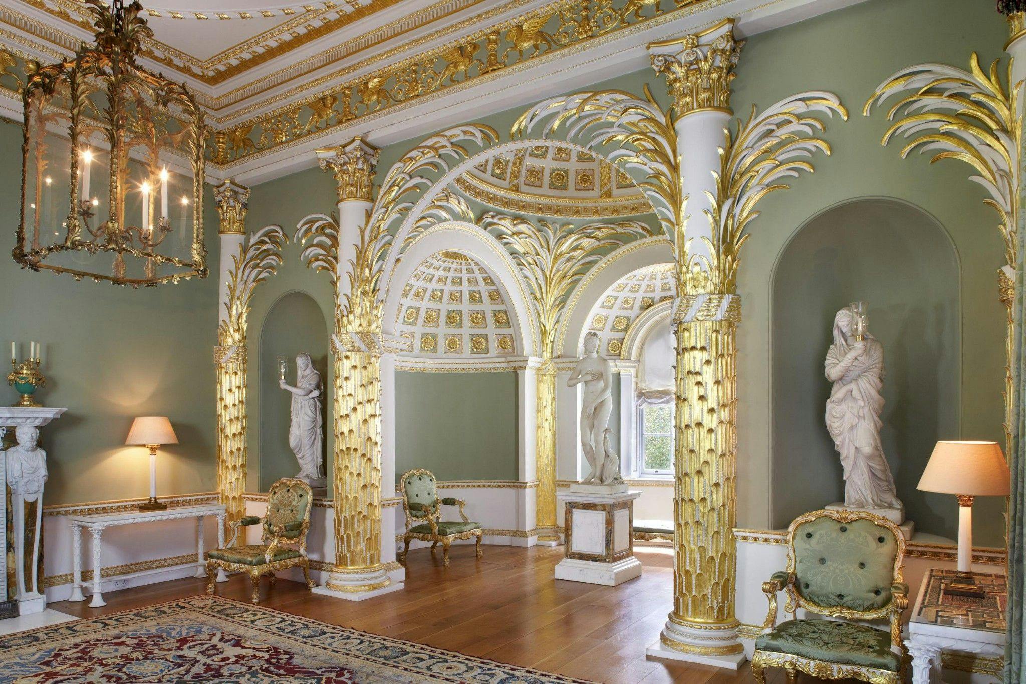 Elegant Lady Spencer’s Room with golden columns, perfect for upscale events and receptions.