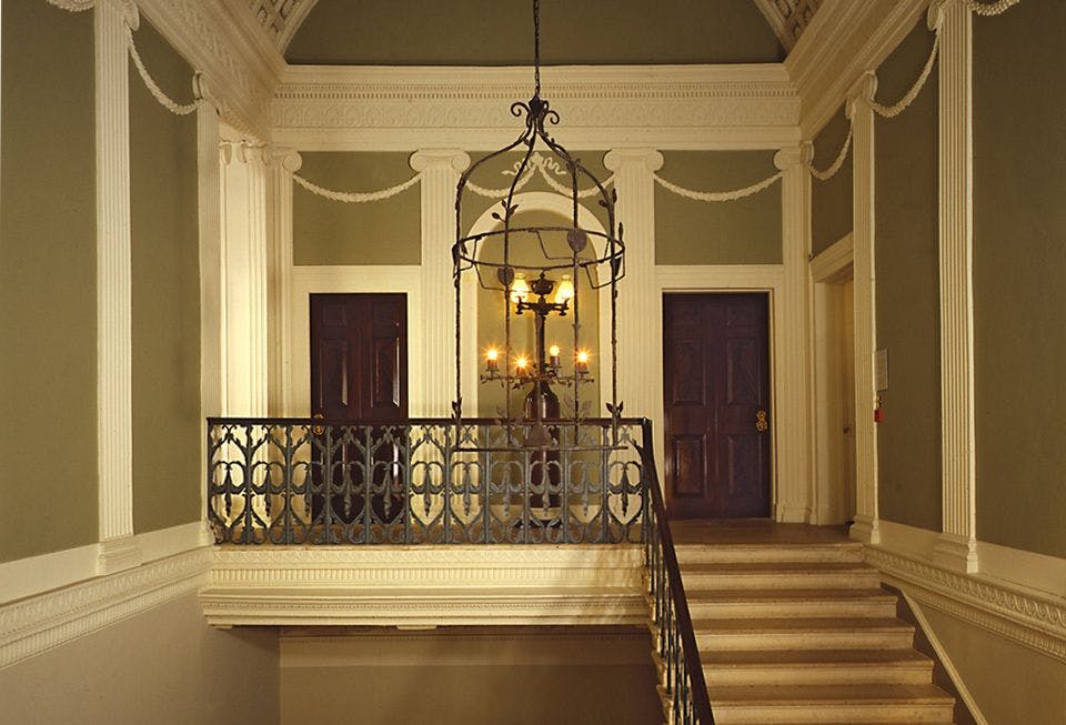 Elegant staircase in Spencer House, perfect for upscale events and intimate gatherings.