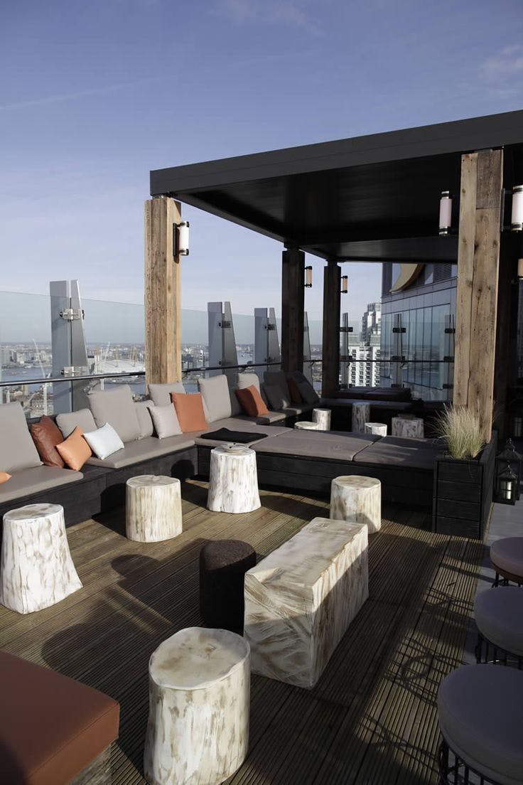 Rooftop terrace at Bōkan 38 Bar with plush seating, ideal for upscale events and gatherings.