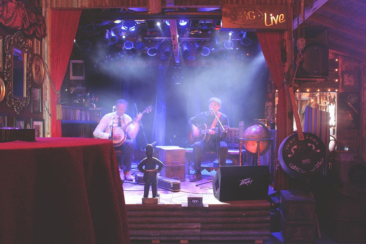 Ole Smokey Stage with dynamic lighting, perfect for live music events and private parties.