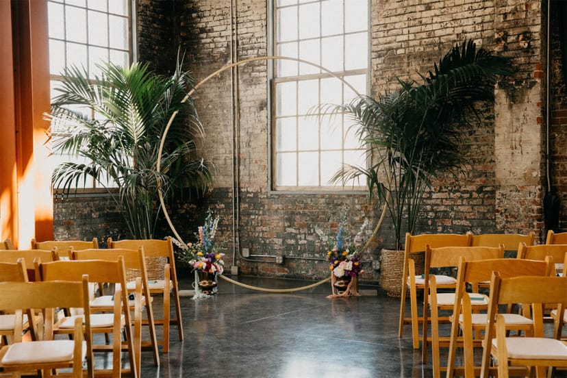 Event space at Huron Substation with floral backdrop, perfect for weddings and gatherings.