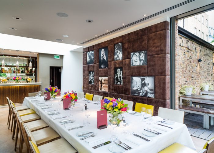 Elegant dining setup at The Conservatory for intimate gatherings and corporate events. - Banner