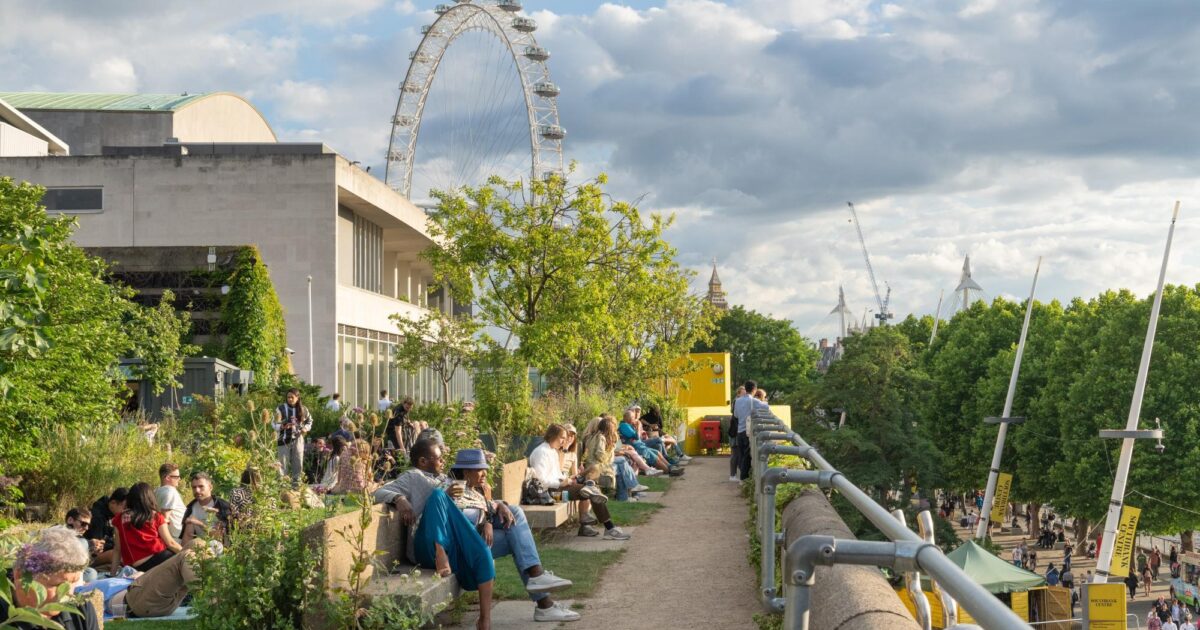 Queen Elizabeth Hall Roof Garden with greenery, seating, and London Eye backdrop for events. - Banner