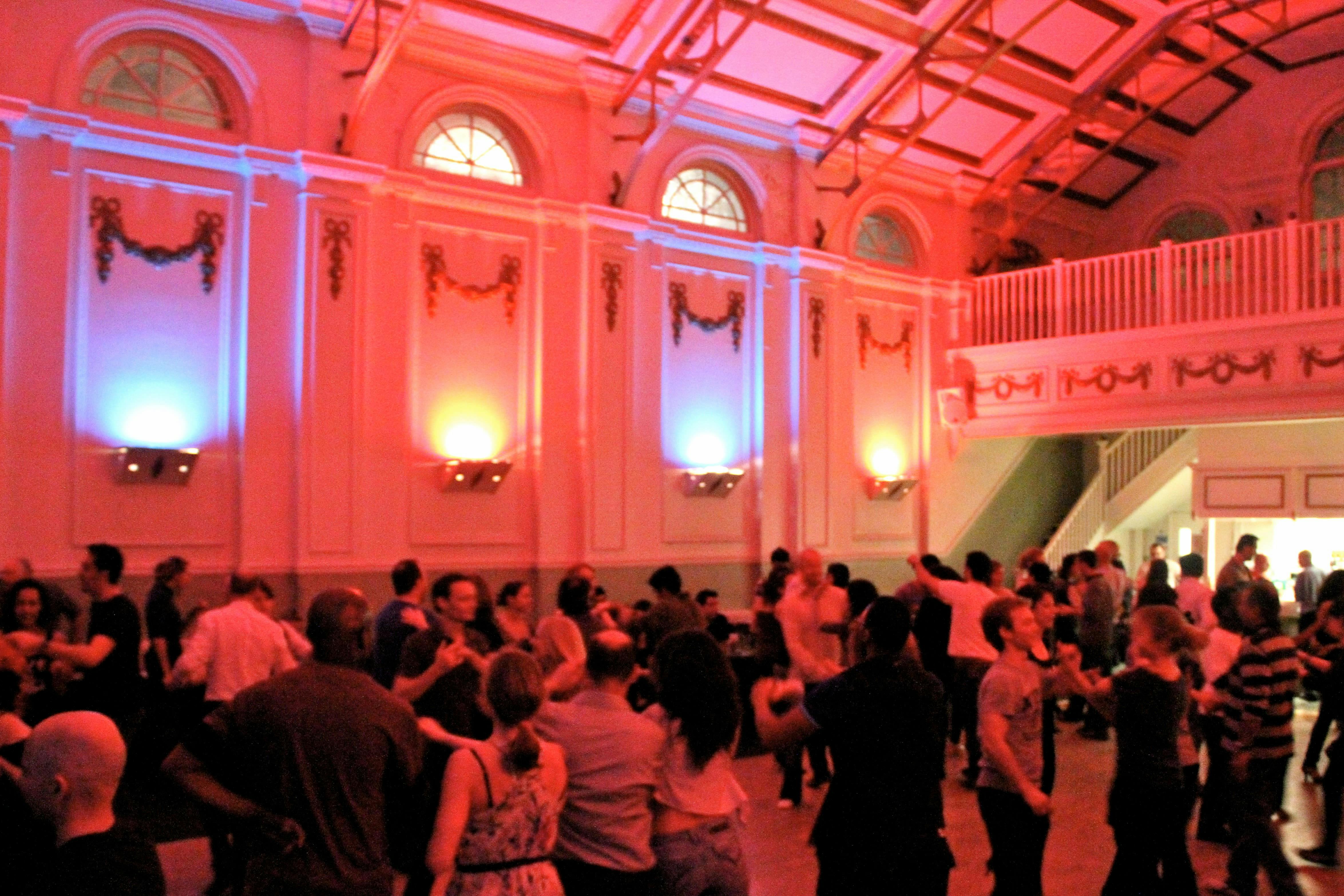Upper Grand Hall at Earl's Court Salsa & Bachata Club, vibrant event space for socializing.