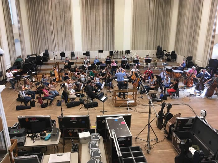 Orchestra rehearsal in Henry Wood Hall, showcasing acoustics and event planning essentials.