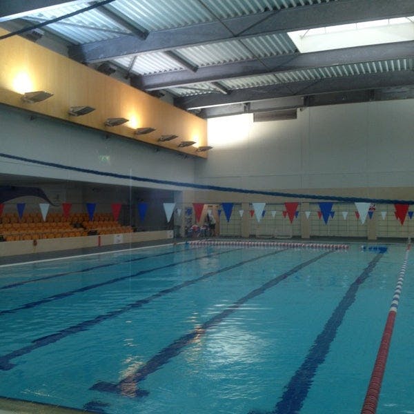 Indoor swimming pool at Mile End Park, perfect for aquatic events and competitions.