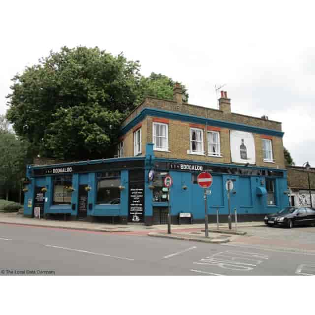 Vibrant blue Boogaloo Pub, perfect for casual meetings and networking events.
