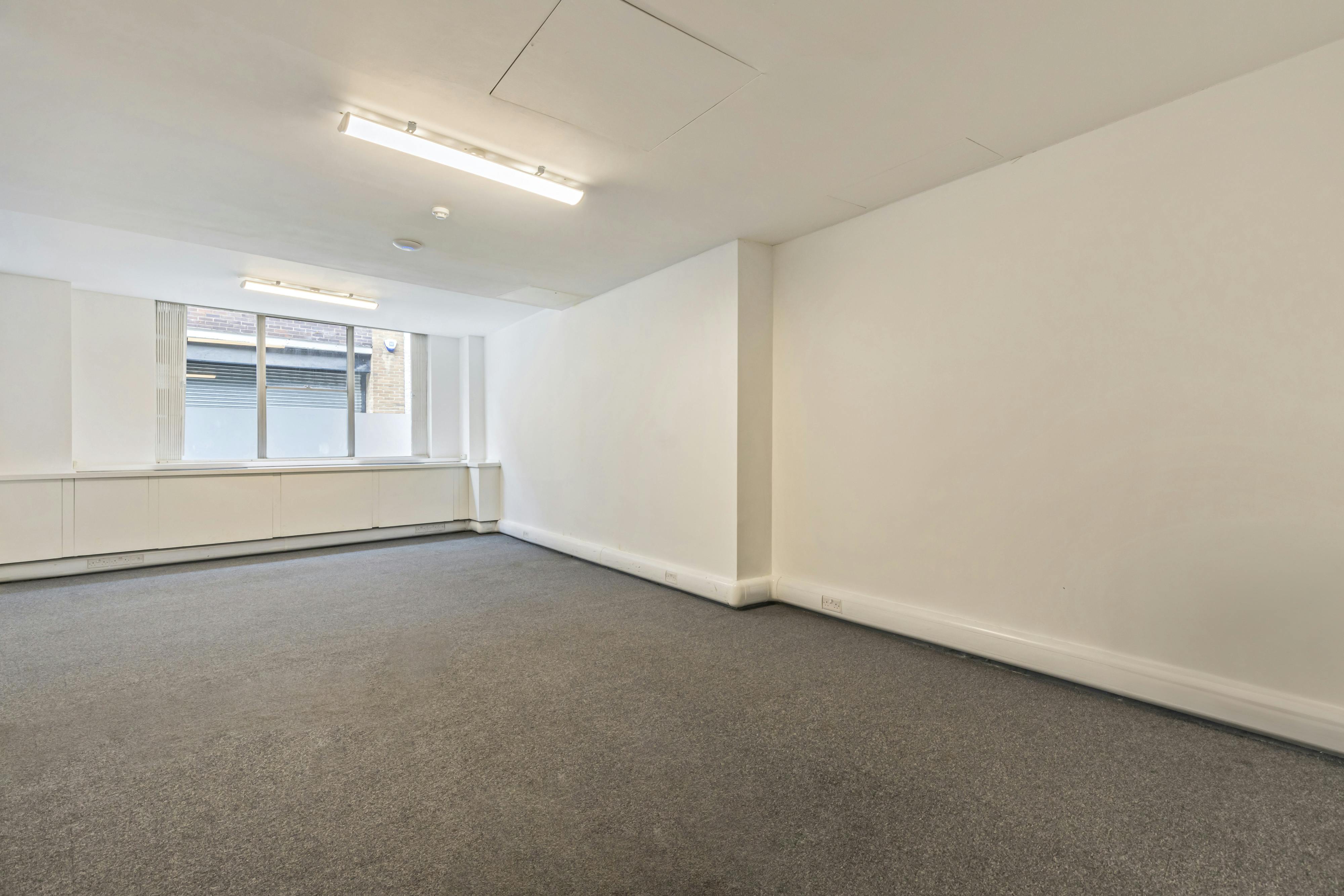 Spacious Meeting Room 3 with natural light for workshops and conferences.