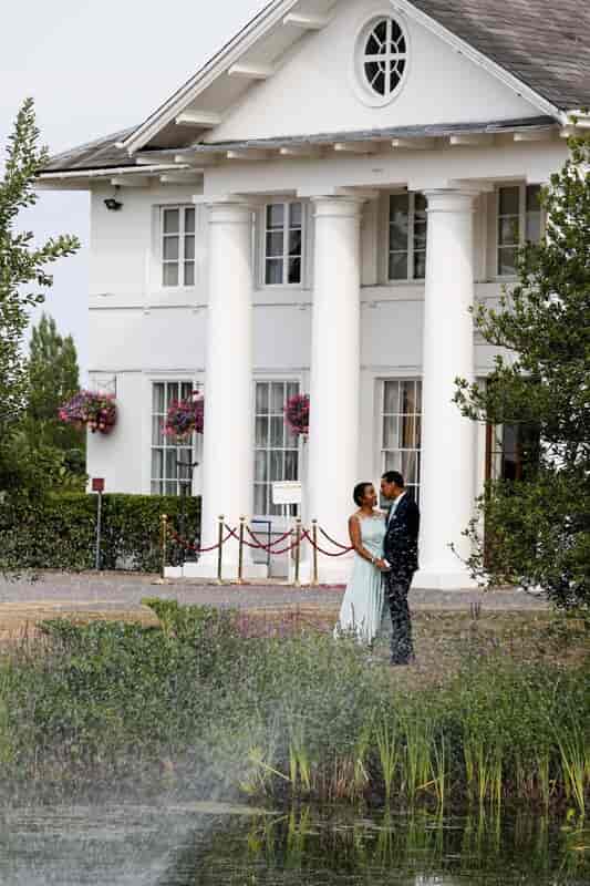 Dyrham Park Country Club bridge, lush greenery, romantic wedding venue