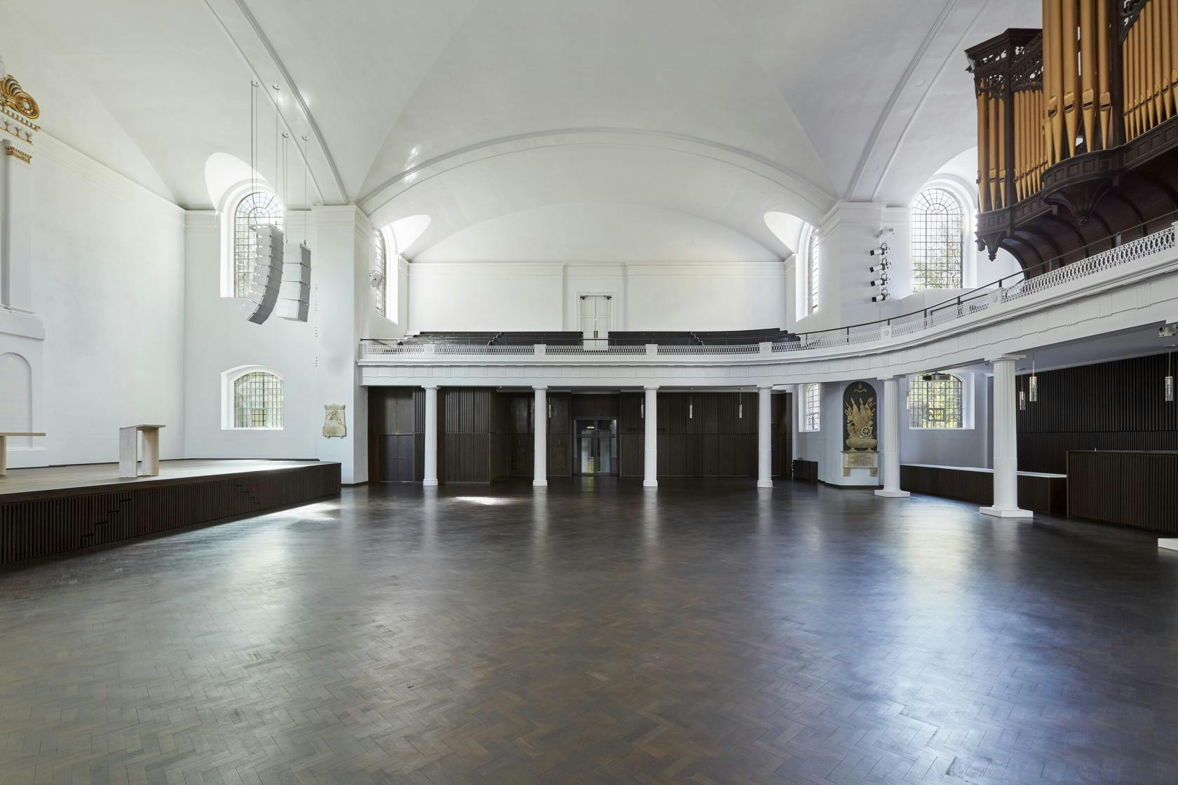 Spacious Mezzanine Level at Hackney Venues, ideal for weddings and conferences.